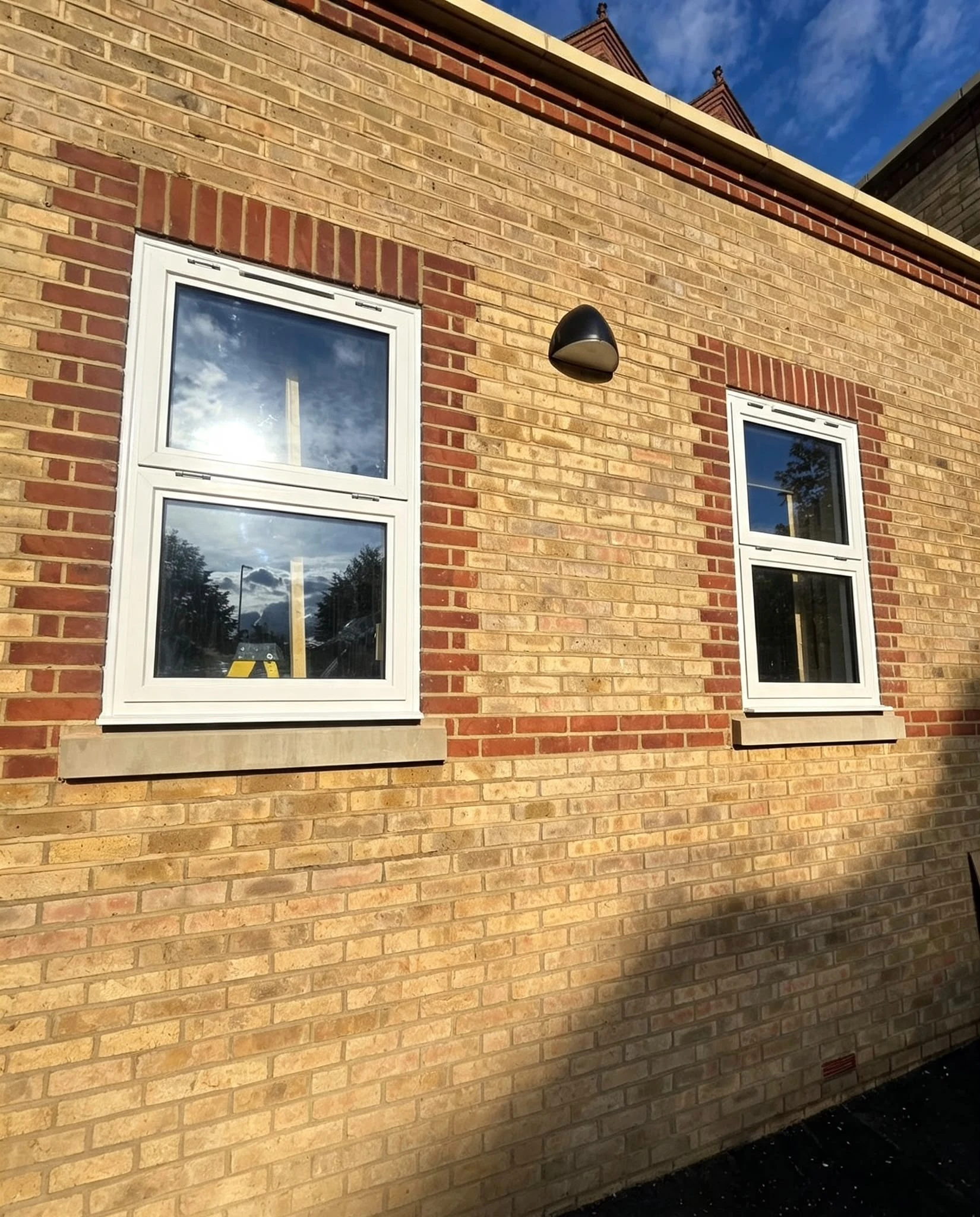 Stacked windows on the side elevation