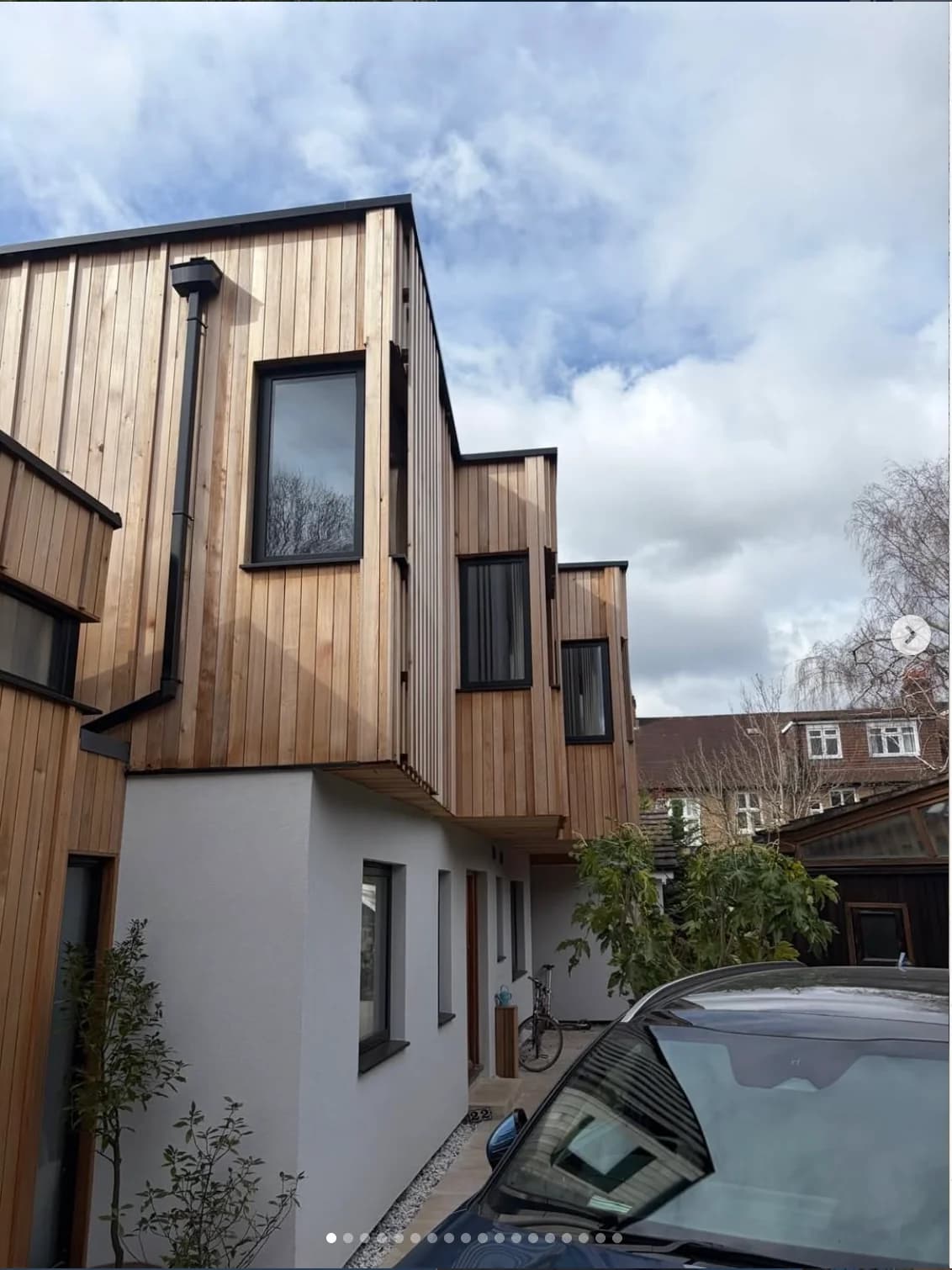 Timber-clad new build exterior — full window and door package, London, by A1 Window Construction Ltd